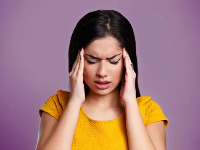 The Relationship & Differences Between TMJ and Migraines